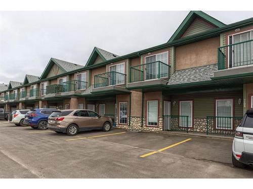 7103-200 Lougheed Drive, Fort Mcmurray, AB - Outdoor With Balcony With Facade