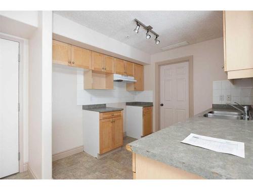 2301-38 Riedel Street, Fort Mcmurray, AB - Indoor Photo Showing Kitchen With Double Sink