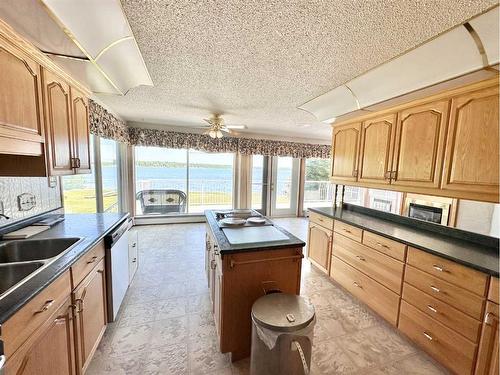 938,13441 665A Twp Rd, Beaver Lake, AB - Indoor Photo Showing Kitchen With Double Sink