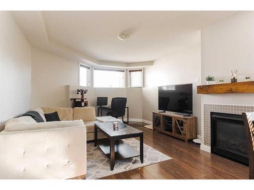 101 Lanauze Street, Fort Mcmurray, AB - Indoor Photo Showing Living Room With Fireplace