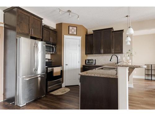 303-9919 Gordon Avenue, Fort Mcmurray, AB - Indoor Photo Showing Kitchen With Stainless Steel Kitchen With Upgraded Kitchen