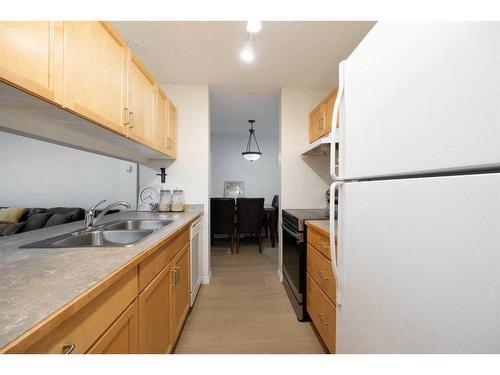 541-200 Richard Street, Fort Mcmurray, AB - Indoor Photo Showing Kitchen With Double Sink