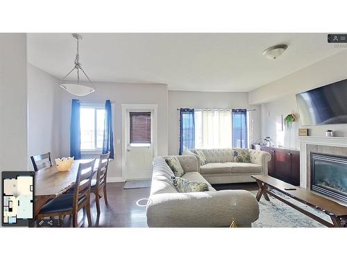 8-313 Millennium Drive, Fort Mcmurray, AB - Indoor Photo Showing Living Room With Fireplace