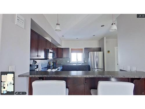 8-313 Millennium Drive, Fort Mcmurray, AB - Indoor Photo Showing Kitchen