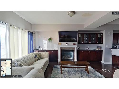 8-313 Millennium Drive, Fort Mcmurray, AB - Indoor Photo Showing Living Room With Fireplace