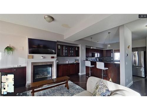 8-313 Millennium Drive, Fort Mcmurray, AB - Indoor Photo Showing Living Room With Fireplace