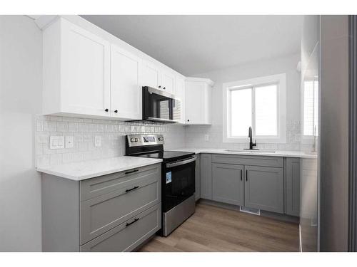 129 Diefenbaker Drive, Fort Mcmurray, AB - Indoor Photo Showing Kitchen With Upgraded Kitchen