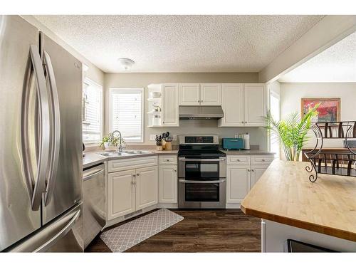 232 Sitka Drive, Fort Mcmurray, AB - Indoor Photo Showing Kitchen With Double Sink