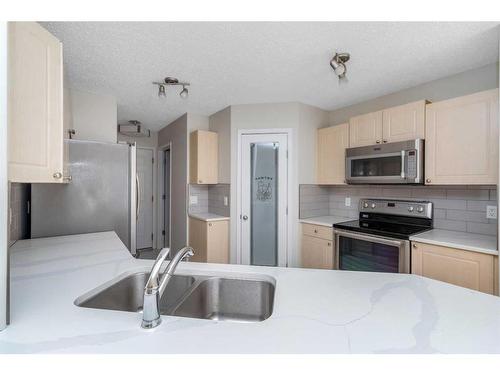 129 Cinnamon Street, Fort Mcmurray, AB - Indoor Photo Showing Kitchen With Stainless Steel Kitchen