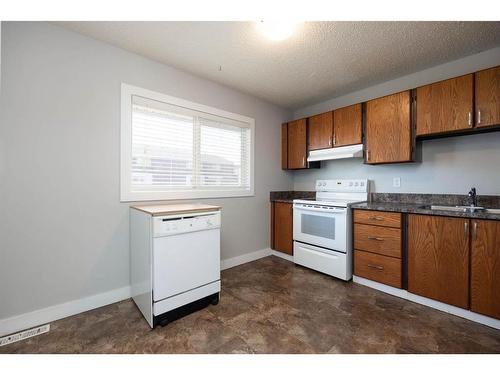 4-400 Silin Forest Road, Fort Mcmurray, AB - Indoor Photo Showing Kitchen