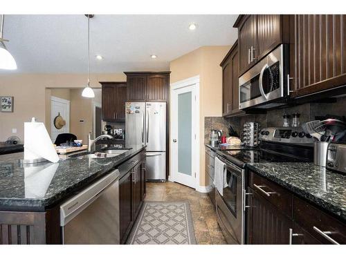 101 Huberman Way, Fort Mcmurray, AB - Indoor Photo Showing Kitchen With Double Sink With Upgraded Kitchen