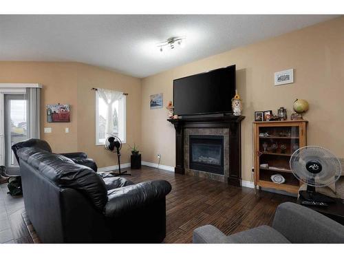 101 Huberman Way, Fort Mcmurray, AB - Indoor Photo Showing Living Room With Fireplace