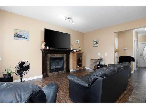 101 Huberman Way, Fort Mcmurray, AB - Indoor Photo Showing Living Room With Fireplace