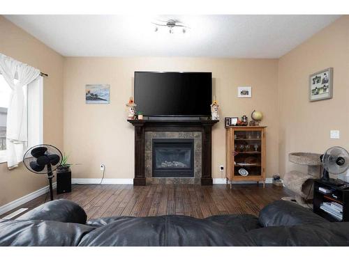 101 Huberman Way, Fort Mcmurray, AB - Indoor Photo Showing Living Room With Fireplace