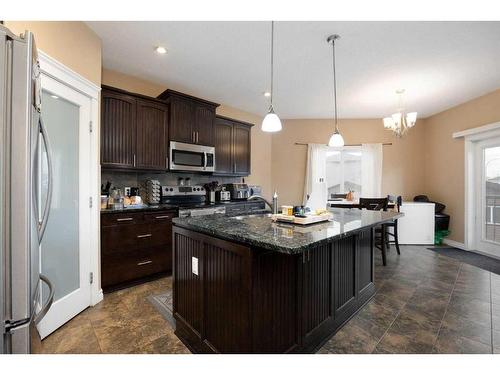 101 Huberman Way, Fort Mcmurray, AB - Indoor Photo Showing Kitchen With Upgraded Kitchen