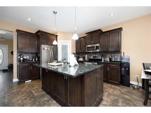 101 Huberman Way, Fort Mcmurray, AB - Indoor Photo Showing Kitchen With Upgraded Kitchen