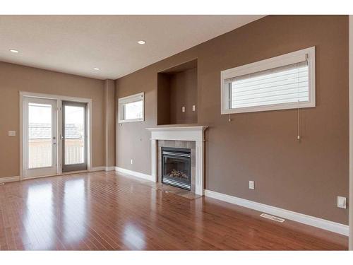 324 Falcon Drive, Fort Mcmurray, AB - Indoor Photo Showing Living Room With Fireplace