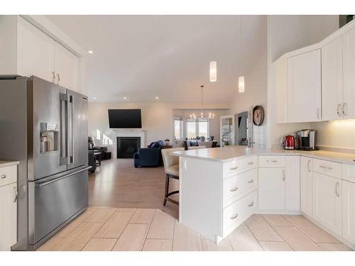 228 Beaverlodge Close, Fort Mcmurray, AB - Indoor Photo Showing Kitchen With Fireplace