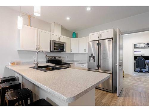 228 Beaverlodge Close, Fort Mcmurray, AB - Indoor Photo Showing Kitchen With Double Sink