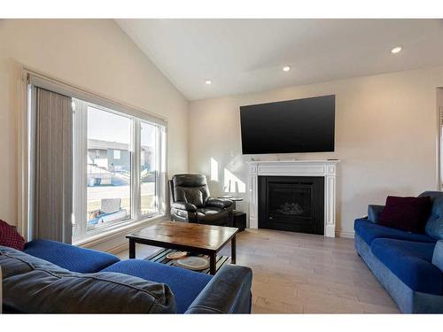 228 Beaverlodge Close, Fort Mcmurray, AB - Indoor Photo Showing Living Room With Fireplace