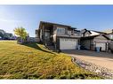 153 Crane Rise, Fort Mcmurray, AB  - Outdoor With Deck Patio Veranda With Facade 