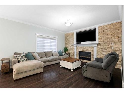 588 Heritage Drive, Fort Mcmurray, AB - Indoor Photo Showing Living Room With Fireplace