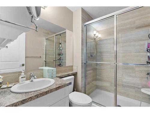 54 Mackenzie Way, Carstairs, AB - Indoor Photo Showing Bathroom