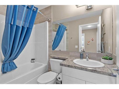 54 Mackenzie Way, Carstairs, AB - Indoor Photo Showing Bathroom