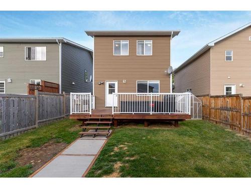 54 Mackenzie Way, Carstairs, AB - Outdoor With Deck Patio Veranda With Exterior