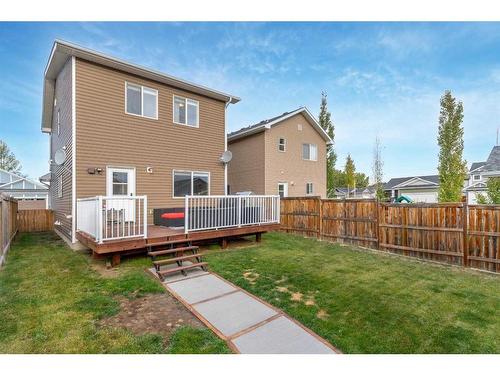 54 Mackenzie Way, Carstairs, AB - Outdoor With Deck Patio Veranda With Exterior