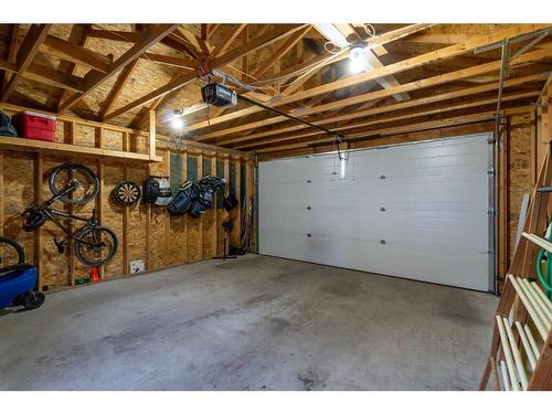 54 Mackenzie Way, Carstairs, AB - Indoor Photo Showing Garage