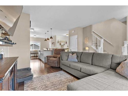 54 Mackenzie Way, Carstairs, AB - Indoor Photo Showing Living Room