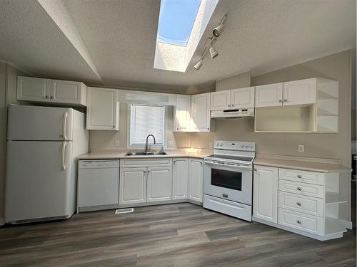 109 Hoehne Street, Fort Mcmurray, AB - Indoor Photo Showing Kitchen With Double Sink