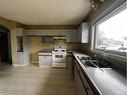 117 Bacon Place, Fort Mcmurray, AB  - Indoor Photo Showing Kitchen With Double Sink 