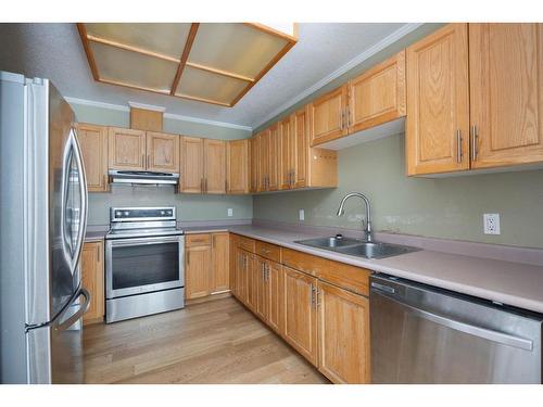 152 Burry Road, Fort Mcmurray, AB - Indoor Photo Showing Kitchen With Double Sink