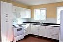 10322 104 Avenue, Lac La Biche, AB  - Indoor Photo Showing Kitchen With Double Sink 