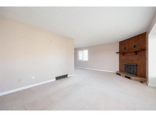 209 Brooks Place, Fort Mcmurray, AB - Indoor With Fireplace