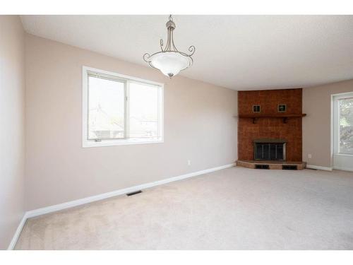 209 Brooks Place, Fort Mcmurray, AB - Indoor With Fireplace