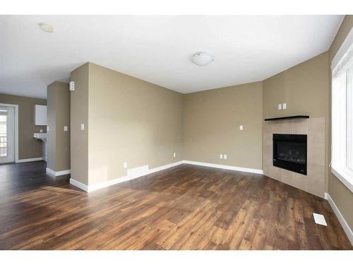 87-401 Athabasca Avenue, Fort Mcmurray, AB - Indoor Photo Showing Other Room With Fireplace