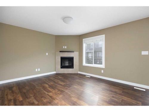 87-401 Athabasca Avenue, Fort Mcmurray, AB - Indoor Photo Showing Living Room With Fireplace