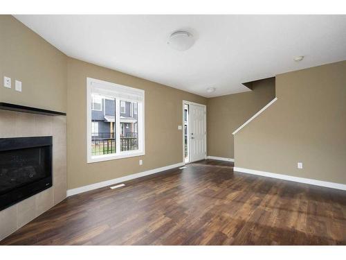 87-401 Athabasca Avenue, Fort Mcmurray, AB - Indoor Photo Showing Living Room With Fireplace