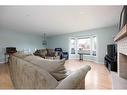 121 Berens Place, Fort Mcmurray, AB  - Indoor Photo Showing Living Room With Fireplace 