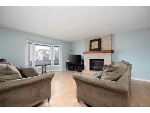 121 Berens Place, Fort Mcmurray, AB - Indoor Photo Showing Living Room With Fireplace