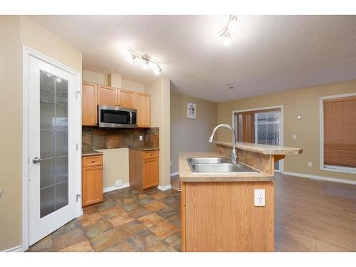 101 Sandstone Lane, Fort Mcmurray, AB - Indoor Photo Showing Kitchen With Double Sink