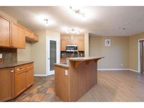 101 Sandstone Lane, Fort Mcmurray, AB - Indoor Photo Showing Kitchen