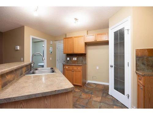 101 Sandstone Lane, Fort Mcmurray, AB - Indoor Photo Showing Kitchen With Double Sink