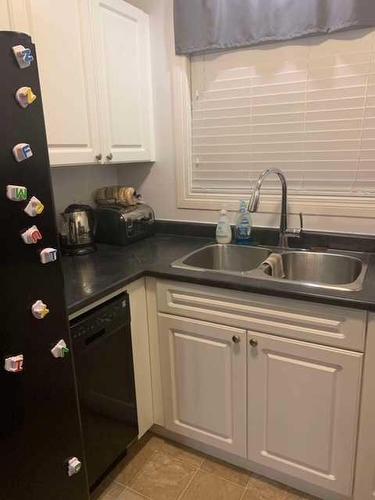 618-600 Signal Road, Fort Mcmurray, AB - Indoor Photo Showing Kitchen With Double Sink