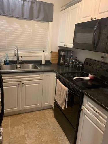 618-600 Signal Road, Fort Mcmurray, AB - Indoor Photo Showing Kitchen With Double Sink