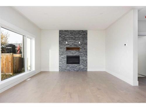 189 Warren Way, Fort Mcmurray, AB - Indoor Photo Showing Living Room With Fireplace