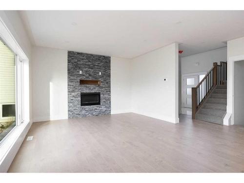 189 Warren Way, Fort Mcmurray, AB - Indoor Photo Showing Living Room With Fireplace